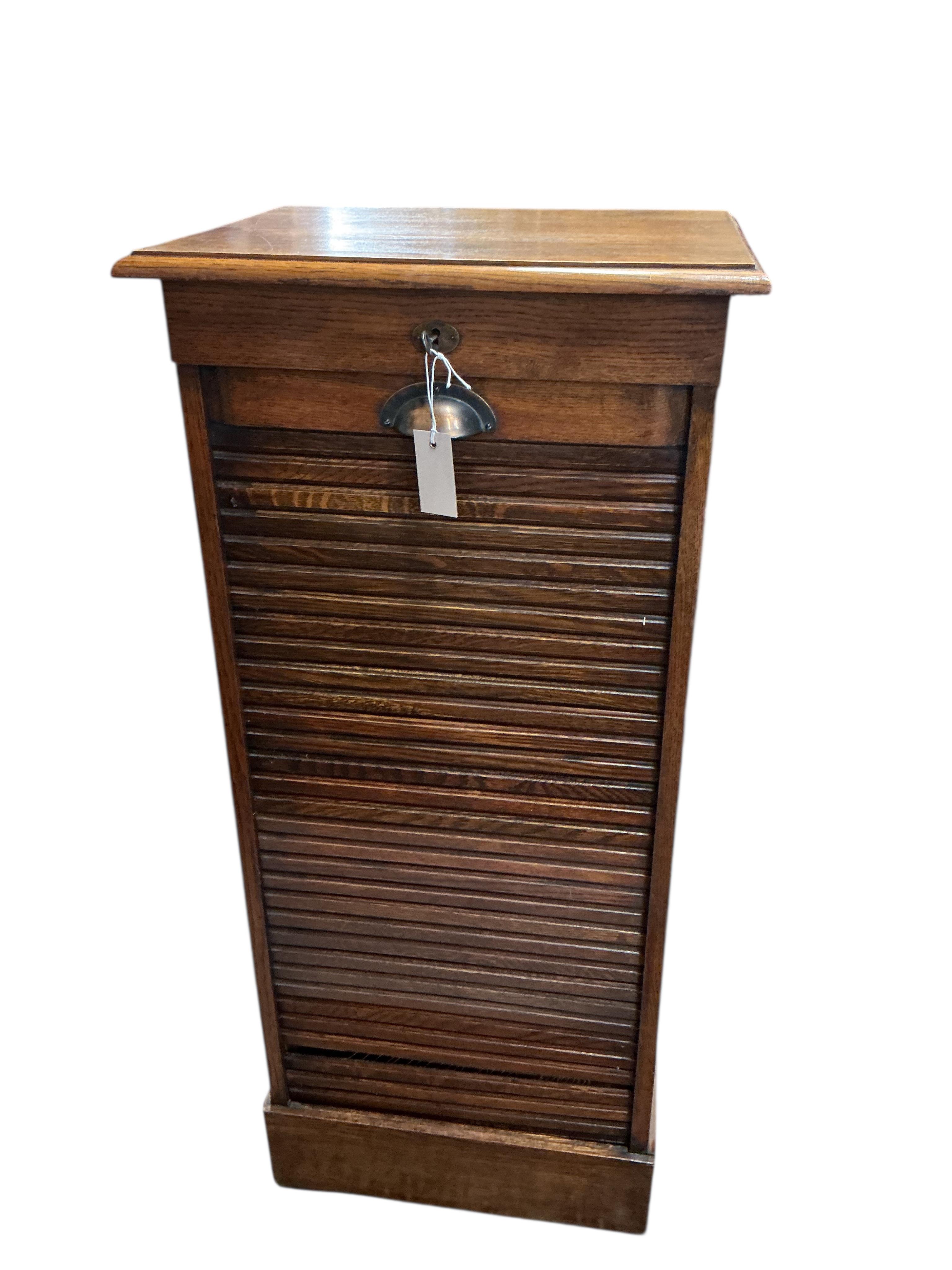 An early 20th century oak tambour filing cabinet, width 50cm, depth 39cm, height 111cm